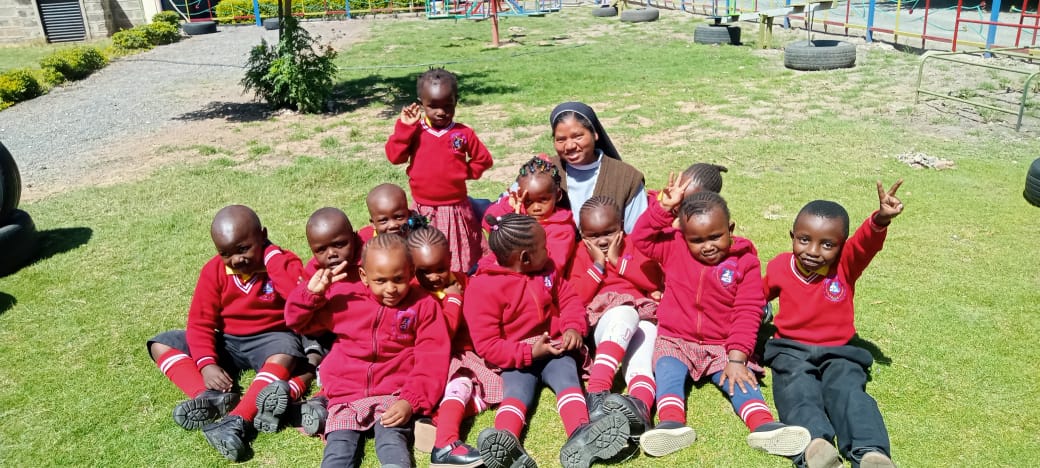 Learners pose for a photo